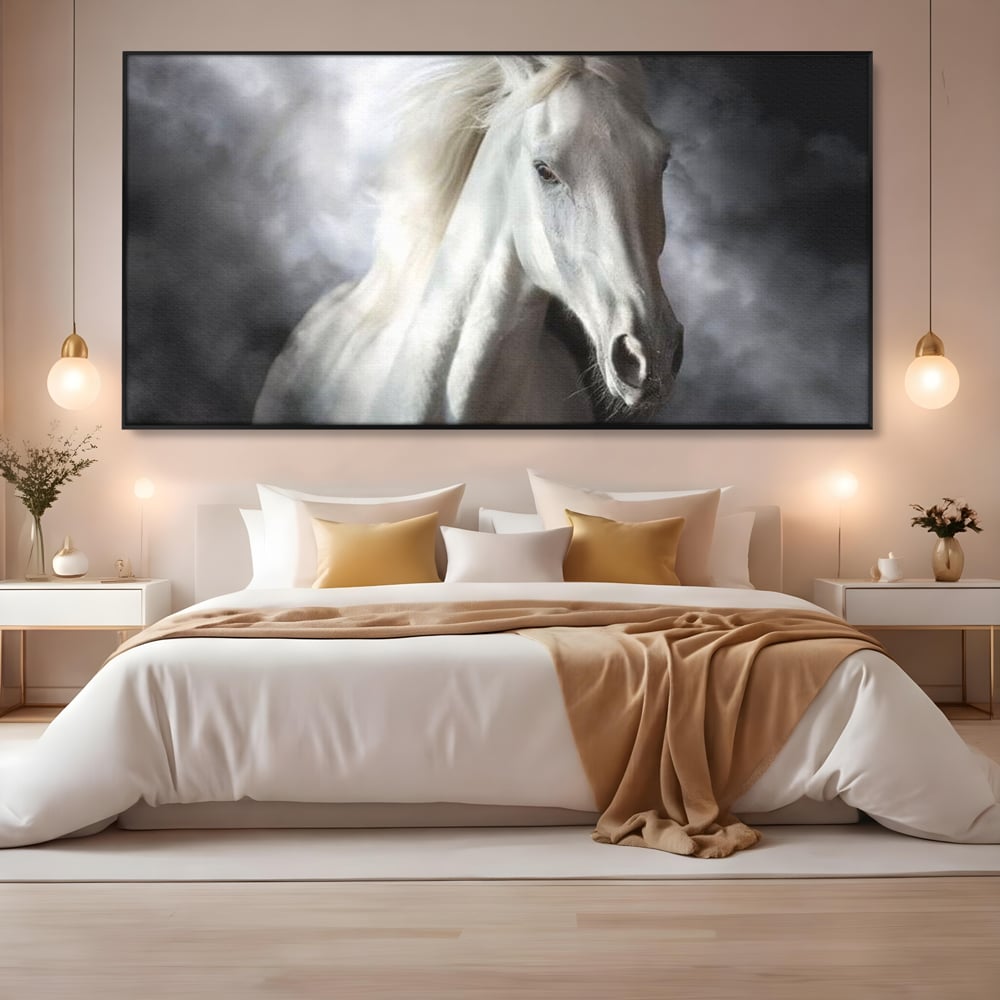 Tablou canvas cu tablou canvas cu un cal alb si nori, in rama de aluminiu negru, pe perete intr-un dormitor